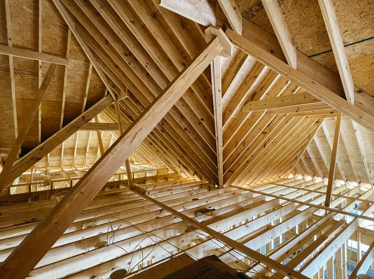 Roof Replacement in East Orange — new timber roof framing and ceiling joists inside an attic